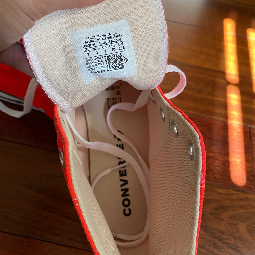 Neon orange converse